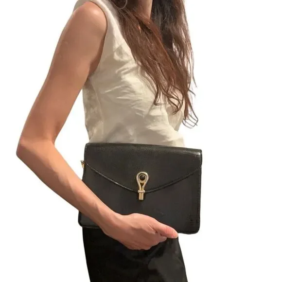 Gucci Black and Gold Leather Clutch